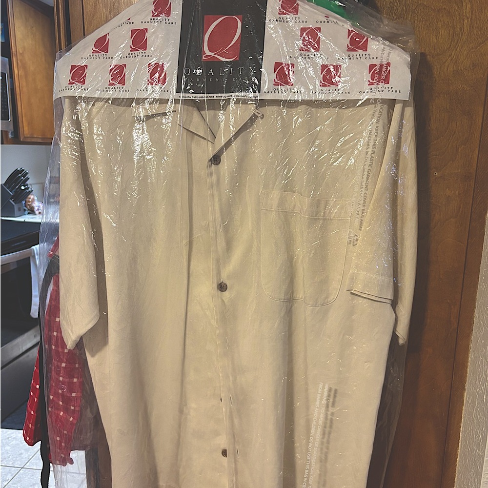 Men’s Tommy Bahamas dress shirt- freshly dry-cleaned. Has 3 tares- see photos